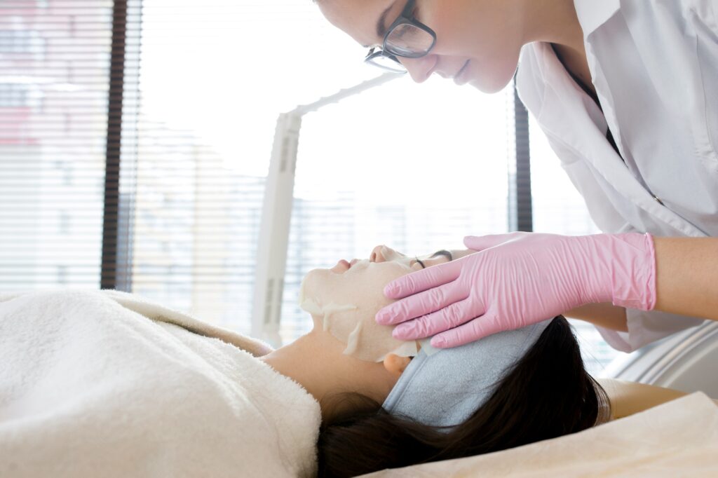 Cosmetologist Performing Professional Facial Care